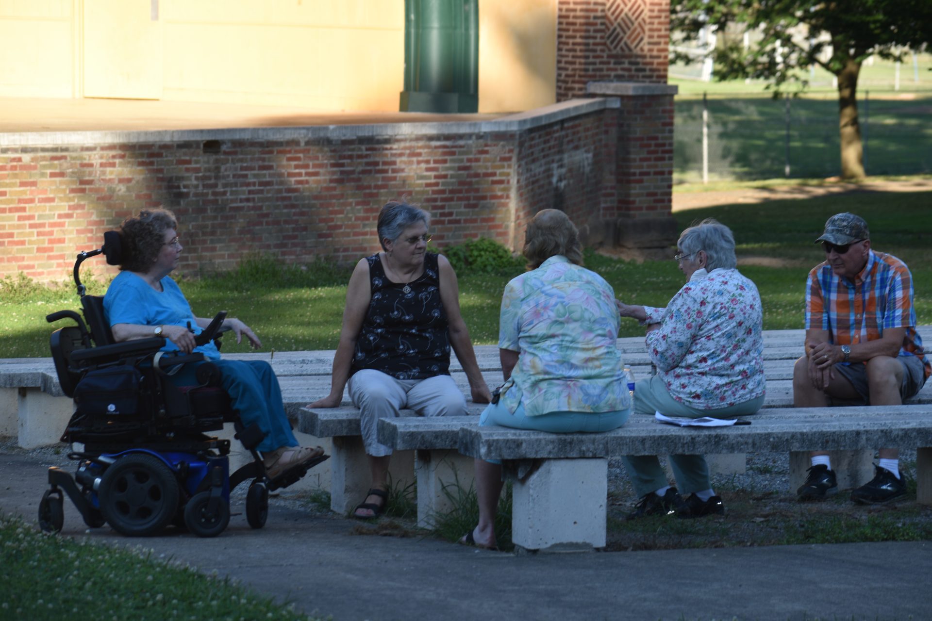 From left: Pat Bole, Nancy Jacobs, Tina Hall, Donna Camp and Rick Jacobs gathered to pray at Brandon Park Friday evening ahead of the National Socialist Movement gathering Saturday.