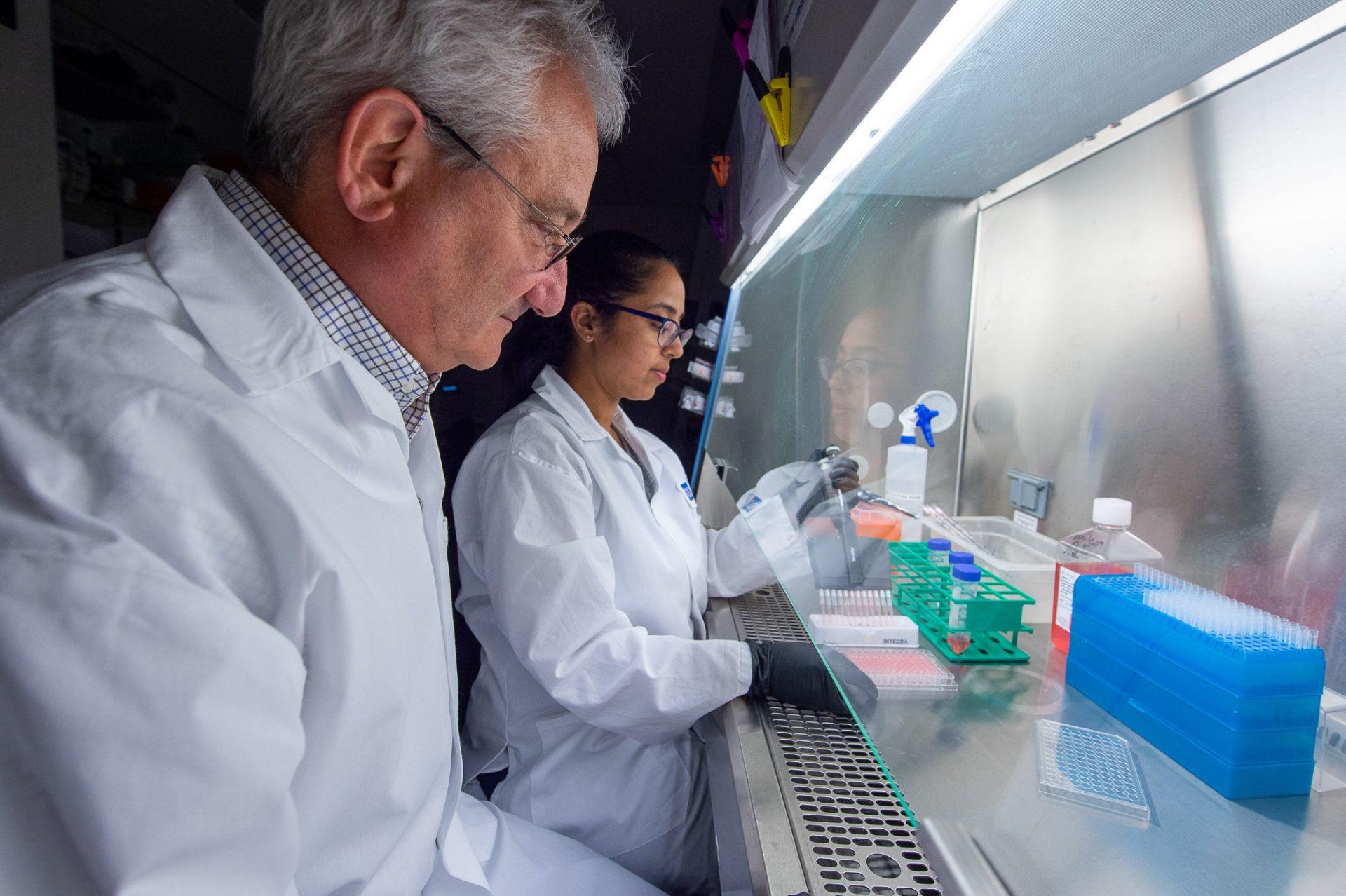 Dr. David Weiner (left), director of Wistar’s Vaccine and Immunotherapy Center, and Dr. Ami Patel, research assistant professor, work on synthetic DNA technology prior to the COVID-19 pandemic outbreak.