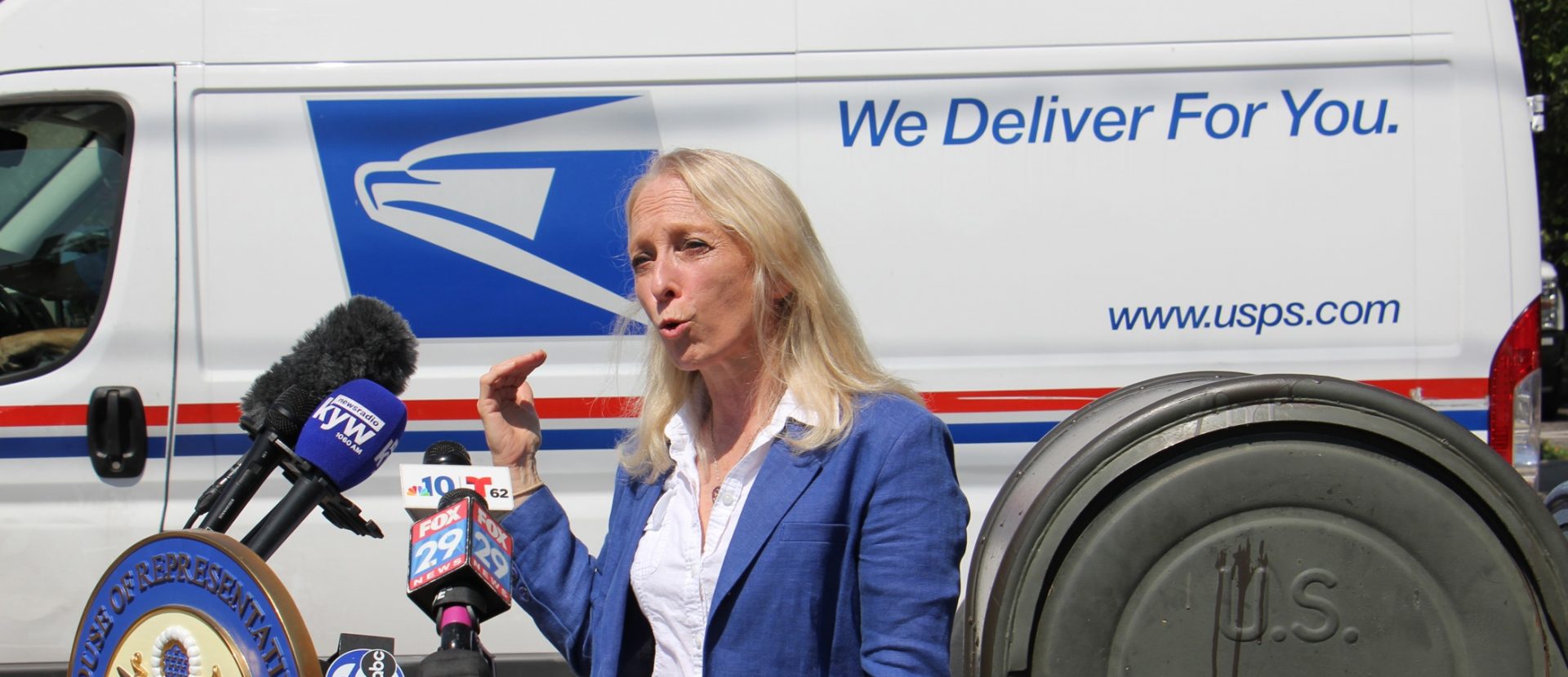 U.S. Rep. Mary Gay Scanlon joins federal, state and local officials at Second and Spring Garden streets to call for emergency funding for the struggling U.S. Postal Service.