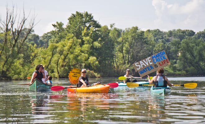 Protesters of Sunoco’s Mariner East Pipline kayaked to a clean-up site on Marsh Creek Lake in Chester County, Pa., where the DEP says 8,000 gallons of drilling mud migrated into the stream. 