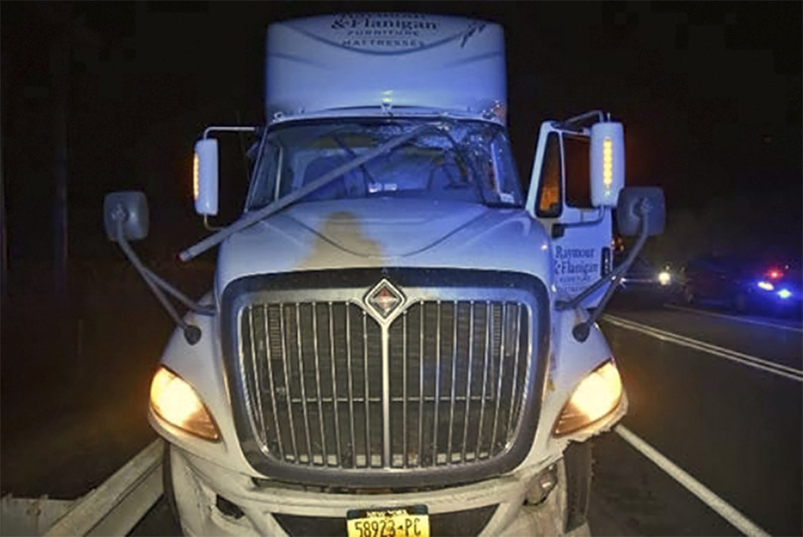 This photo provided by the Pennsylvania State Police shows a truck's windshield damaged by a 10-foot section of electrical conduit that struck the driver in the head, killing him, on Feb. 21, 2018. The conduit broke away from the ceiling of the Lehigh Tunnel along the Pennsylvania Turnpike in East Penn Township, Carbon County, Pa. In a preliminary report issued Tuesday, May 1, 2018, by the National Transportation Safety Board, federal investigators say steel straps holding electrical conduits to the tunnel's ceiling had corroded before the accident that killed 70-year-old Howard Sexton III, of Mickleton, N.J.