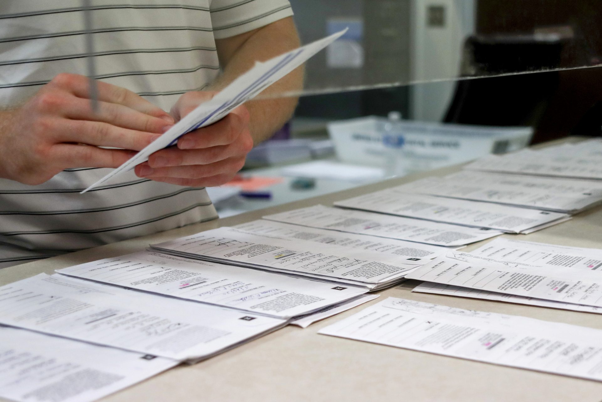 Butler County Bureau of Elections staff processes mailed ballots May 28, 2020, in Butler, Pa., ahead of the presidential primary June 2.