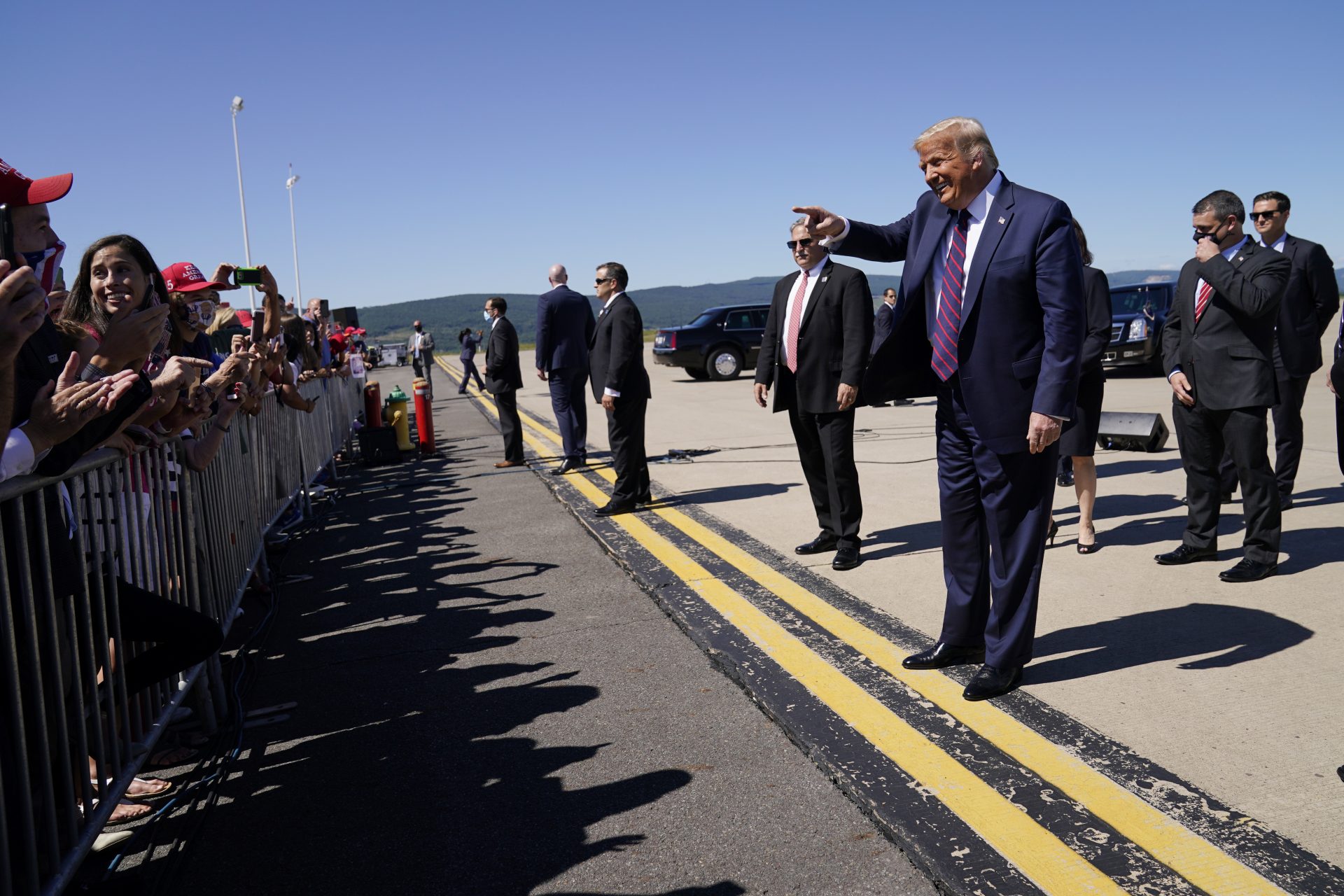 President Donald Trump greets supporters after arriving at at Wilkes-Barre Scranton International Airport, Thursday, Aug. 20, 2020, in Avoca, Pa.