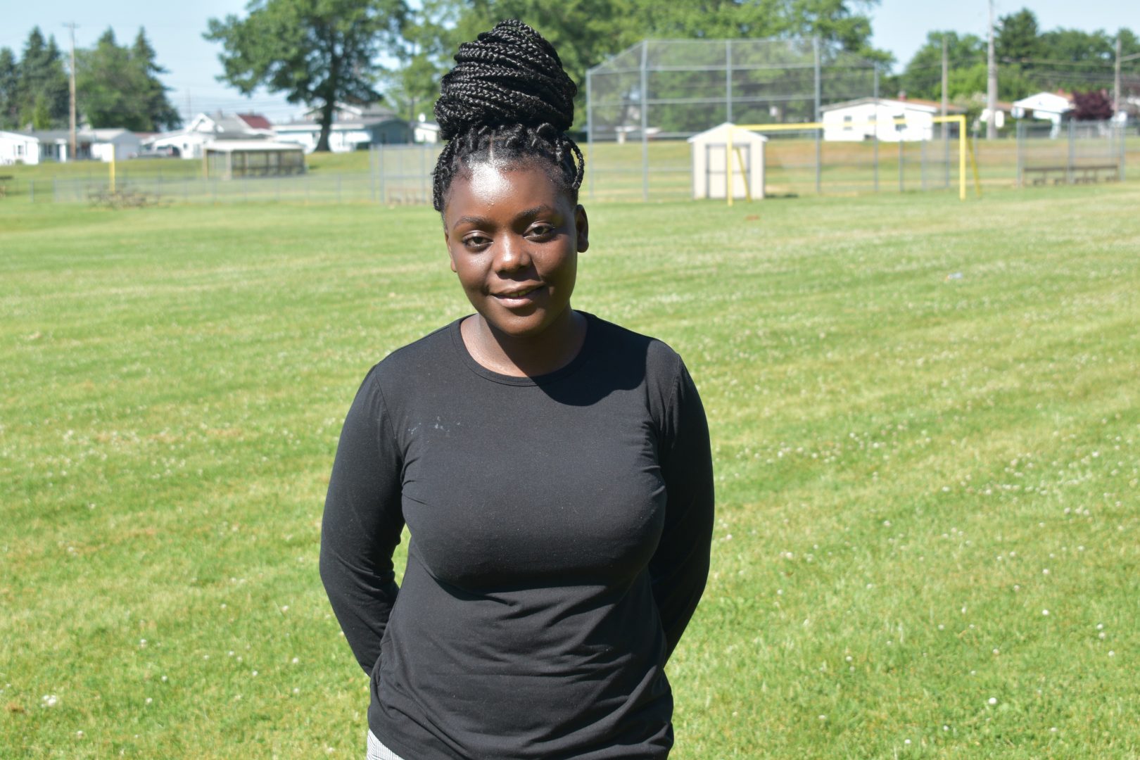 Biletambe Malango stands at a park near her home in Erie on June 19, 2020. 