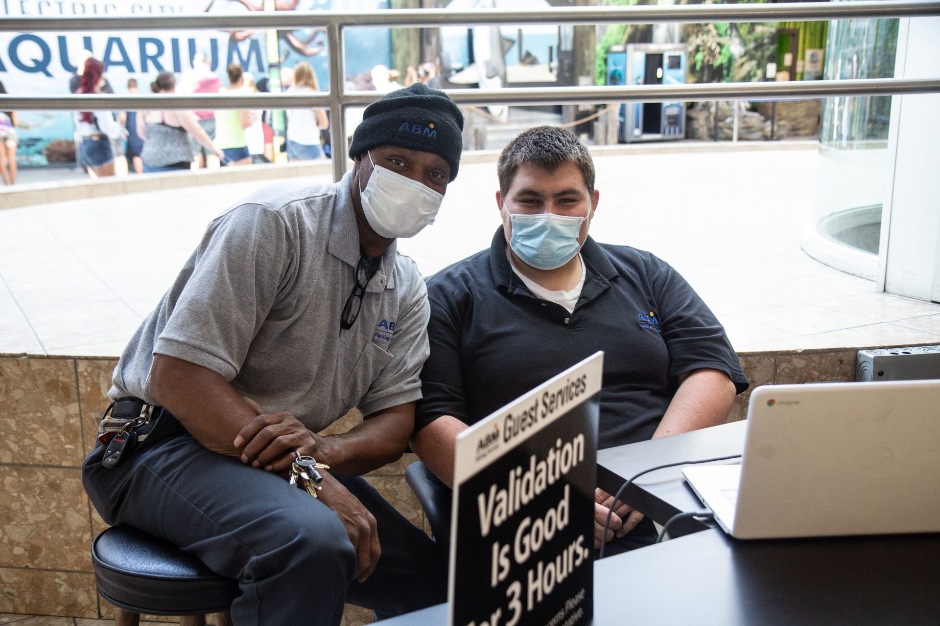 Bernard Graham (left) and Andrew Gale (right) have opposing political views but are friends who work together at the Steamtown Mall in Scranton, Pa.