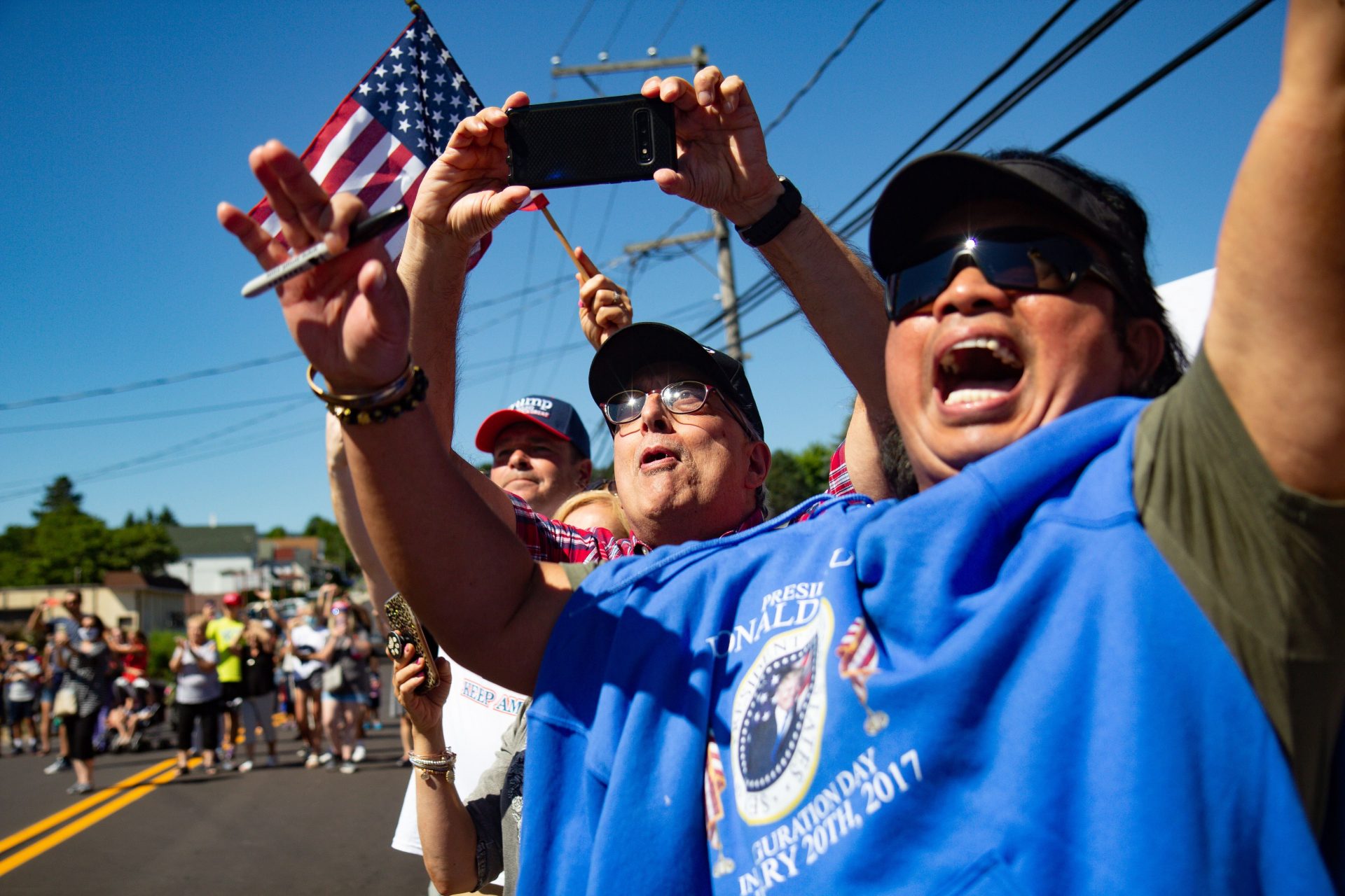 Trump fans excitedly greeted his motorcade as he campaigned in Old Forge, Pa., Thursday.