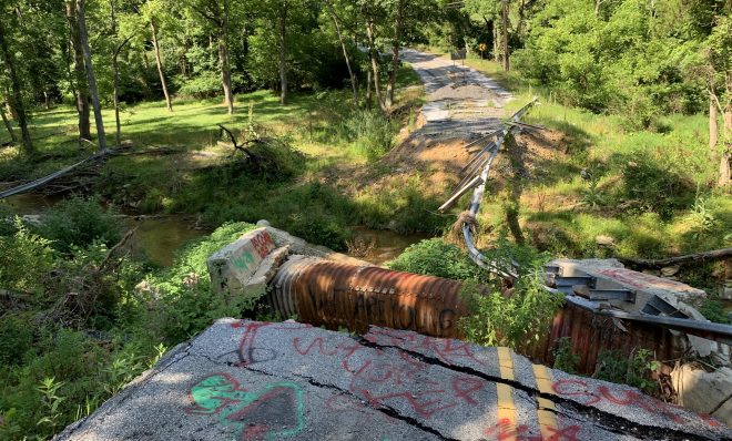 Old Forge Road in Chanceford Township, York County is seen here on July 21, 2020-- nearly two years after flash floods carried away part of the road. Climate change is contributing to stronger storms with heavier rainfall, which are challenging people and communities across Pennsylvania and elsewhere.