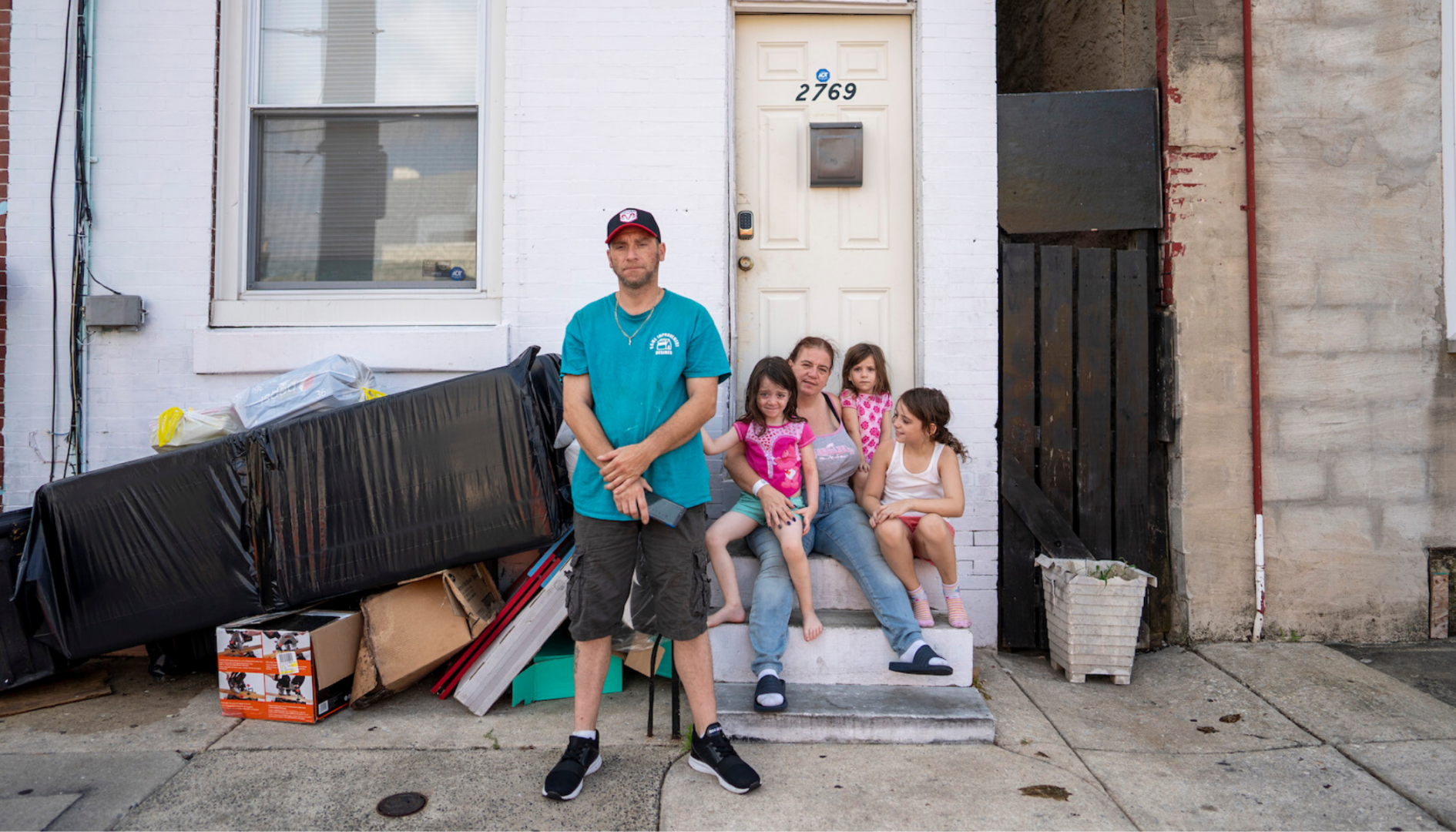 Mike Fallaro and Lisa Swinehart lost work during the pandemic and have been threatened with eviction from their Kensington rowhouse. Two of their three children are scheduled to start school this week. (Jessica Kourkounis for Keystone Crossroads)