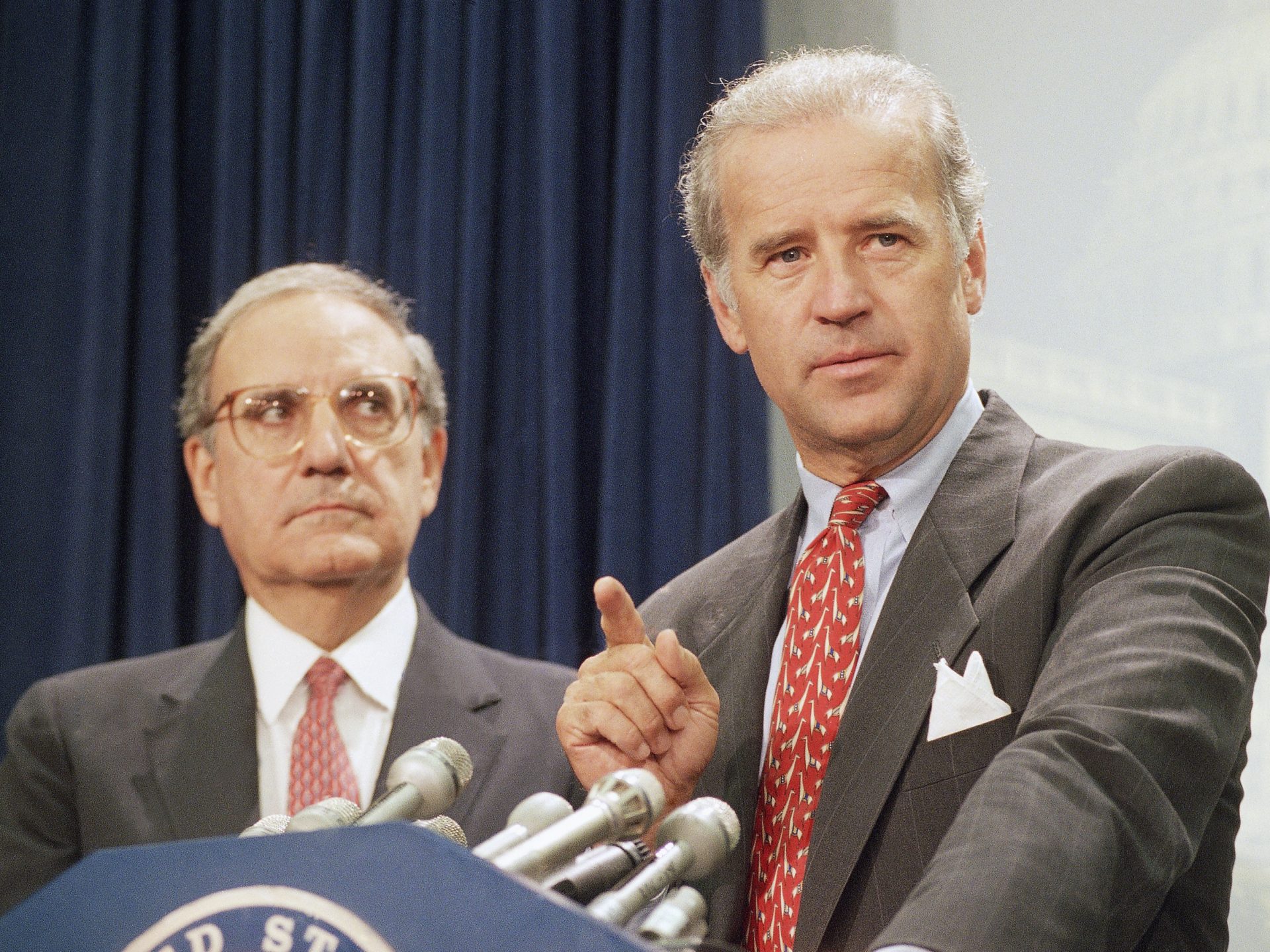 FILE PHOTO: Then-Sen. Joe Biden, right, at Capitol Hill news conference in 1994 after the Senate voted on a major crime bill.