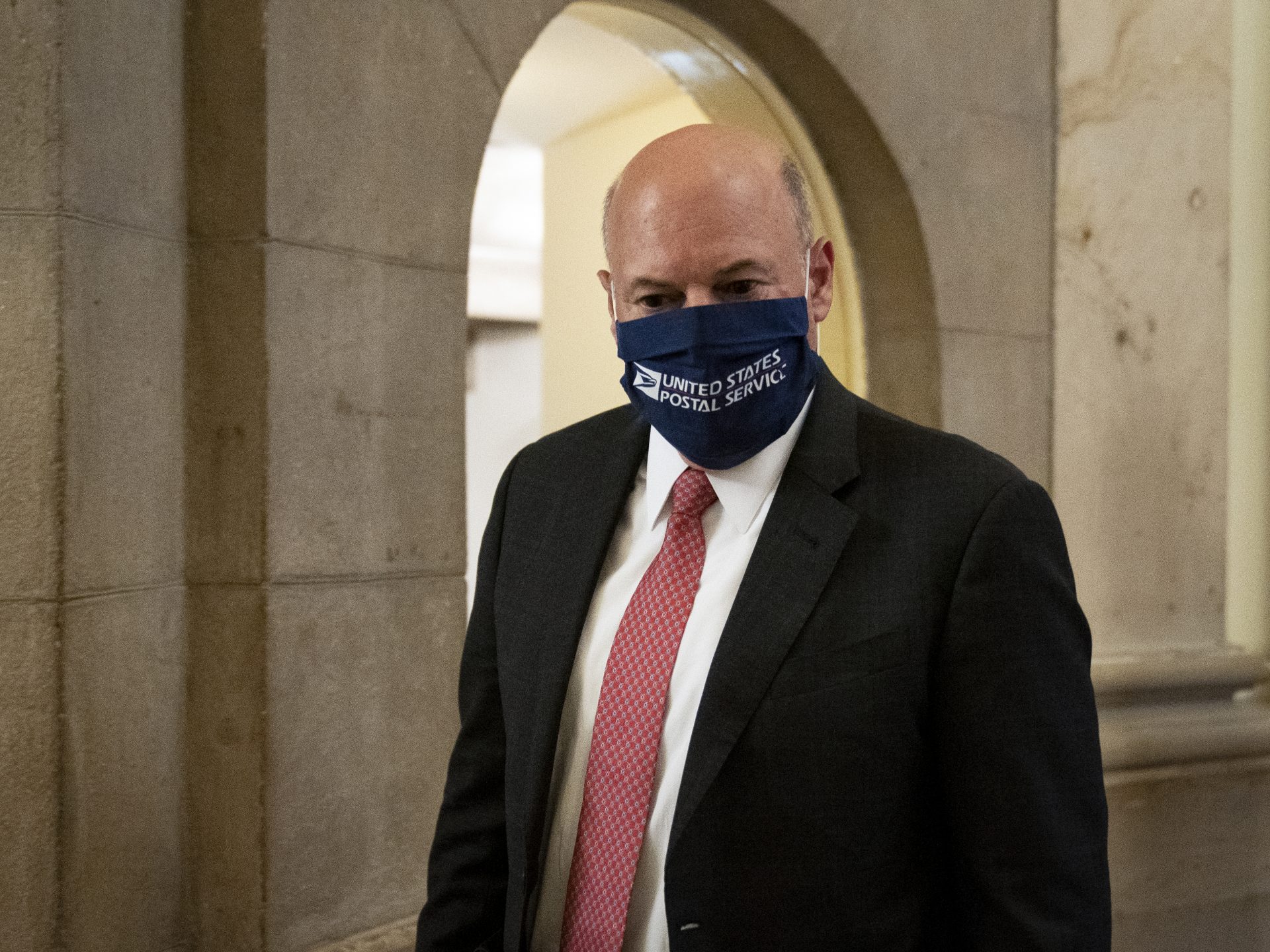 Postmaster General Louis DeJoy departs from a meeting in the Capitol in early August.