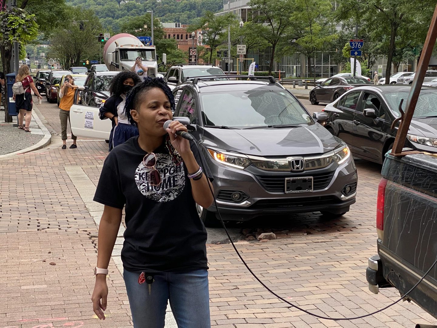 FILE PHOTO: Allegheny County Councilor Olivia Bennett speaks during a rally to extend an eviction moratorium in downtown Pittsburgh on Monday, Aug. 31, 2020.