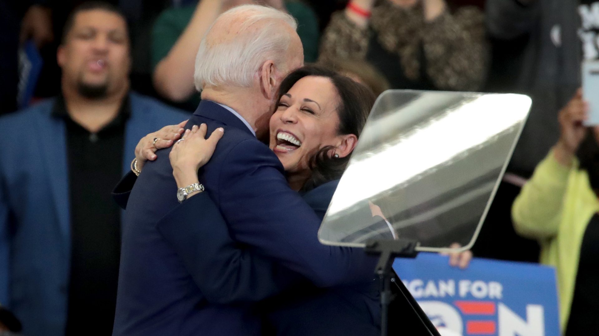 Biden and Harris hug after she endorsed and introduced him at a March 9 campaign rally in Detroit.