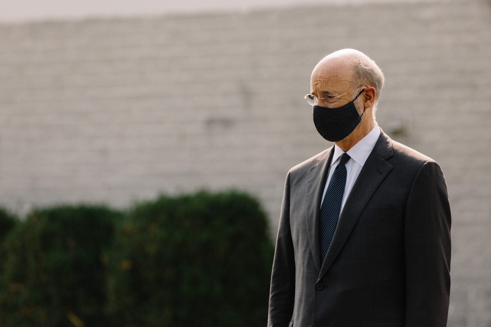 FILE PHOTO: Gov. Tom Wolf wears a face mask at a press event at Discovery Kids Child Care in Middletown on Aug. 25, 2020.