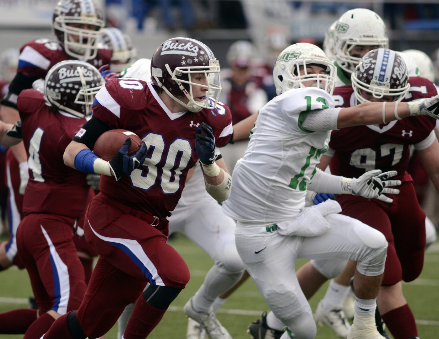 FILE PHOTO: Dunmore's Garrett Murray (30) picks up yardage during the first half  of the PIAA Class AA championship high school football game against South Fayette in Hershey, Pa. on Saturday, Dec. 13, 2014. 