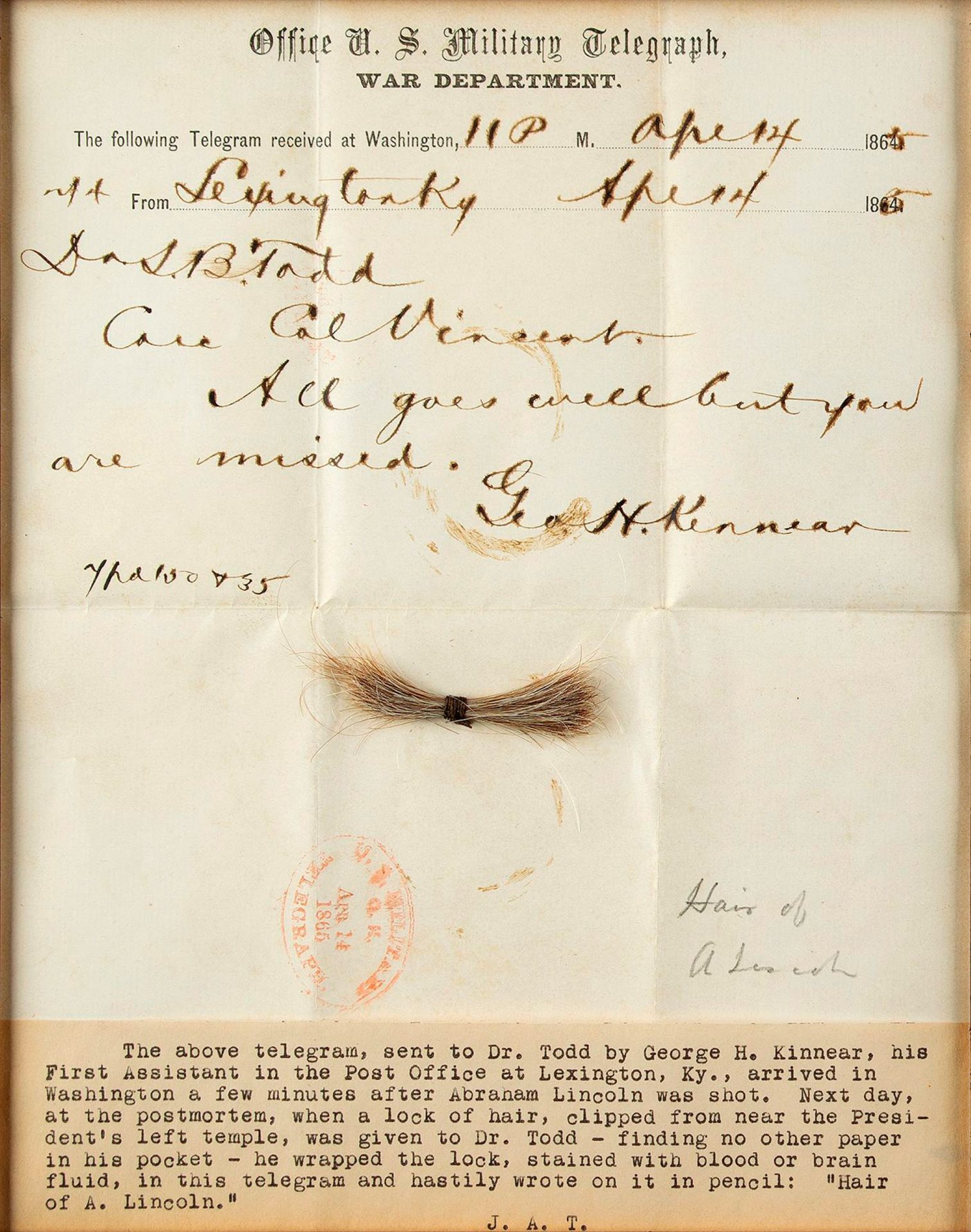 This July 2020 photo released by RR Auction shows a bloodstained telegram and lock of hair from former President Abraham Lincoln, to be auctioned Sept. 12, 2020, by the Boston-based auction firm. The lock of hair was removed during Lincoln's postmortem examination in April 1865 after he was fatally shot by John Wilkes Booth at Ford's Theatre in Washington.
