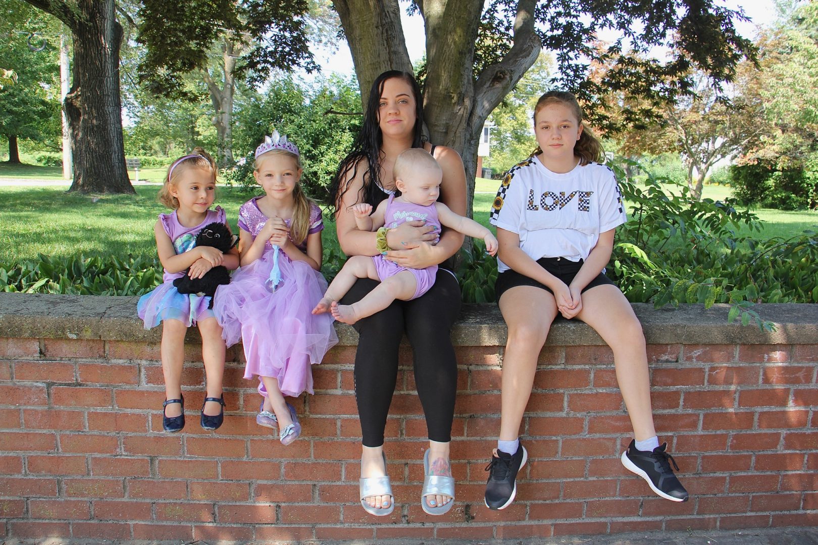 As a single mother of four, Tiffani Szabara finds virtual school challenging for her two oldest daughters.  They are (from left) Brinley, 4, first year Cadence, 6, Emmarie, 1, and seventh year Jaedlyn, 12. 