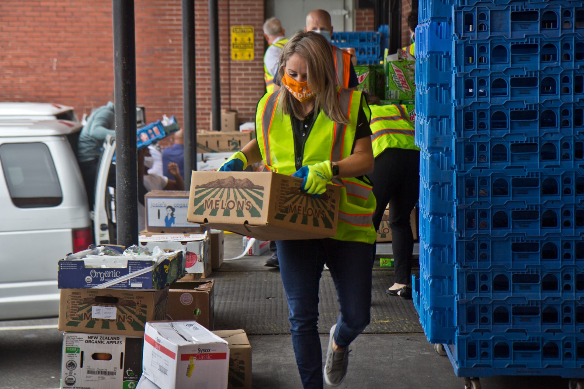 Jane Clements-Smith, executive director of Feeding PA, helps load trucks at Philabundance’s South Philly location.