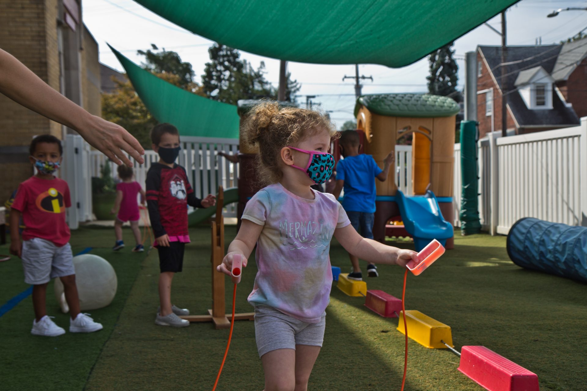 Kids at Today’s Child daycare in Clifton Heights, Pa., have supervised playtime outside.