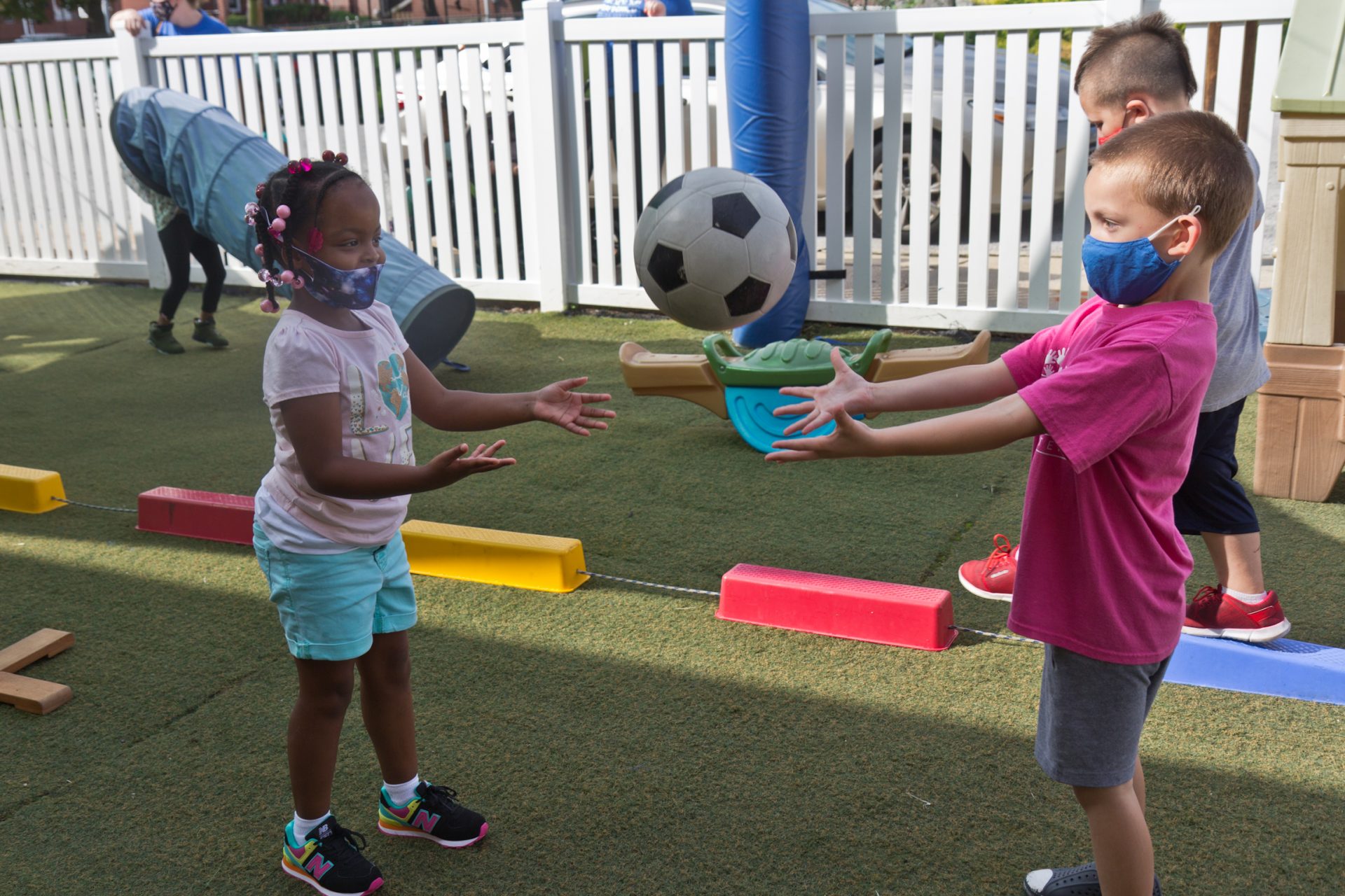 Kids at Today’s Child daycare in Clifton Heights, Pa., have supervised playtime outside.