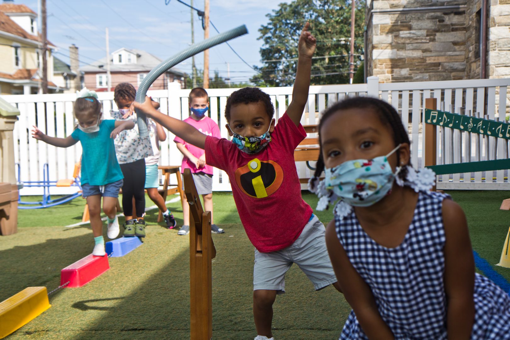 Kids at Today’s Child daycare in Clifton Heights, Pa., have supervised playtime outside.