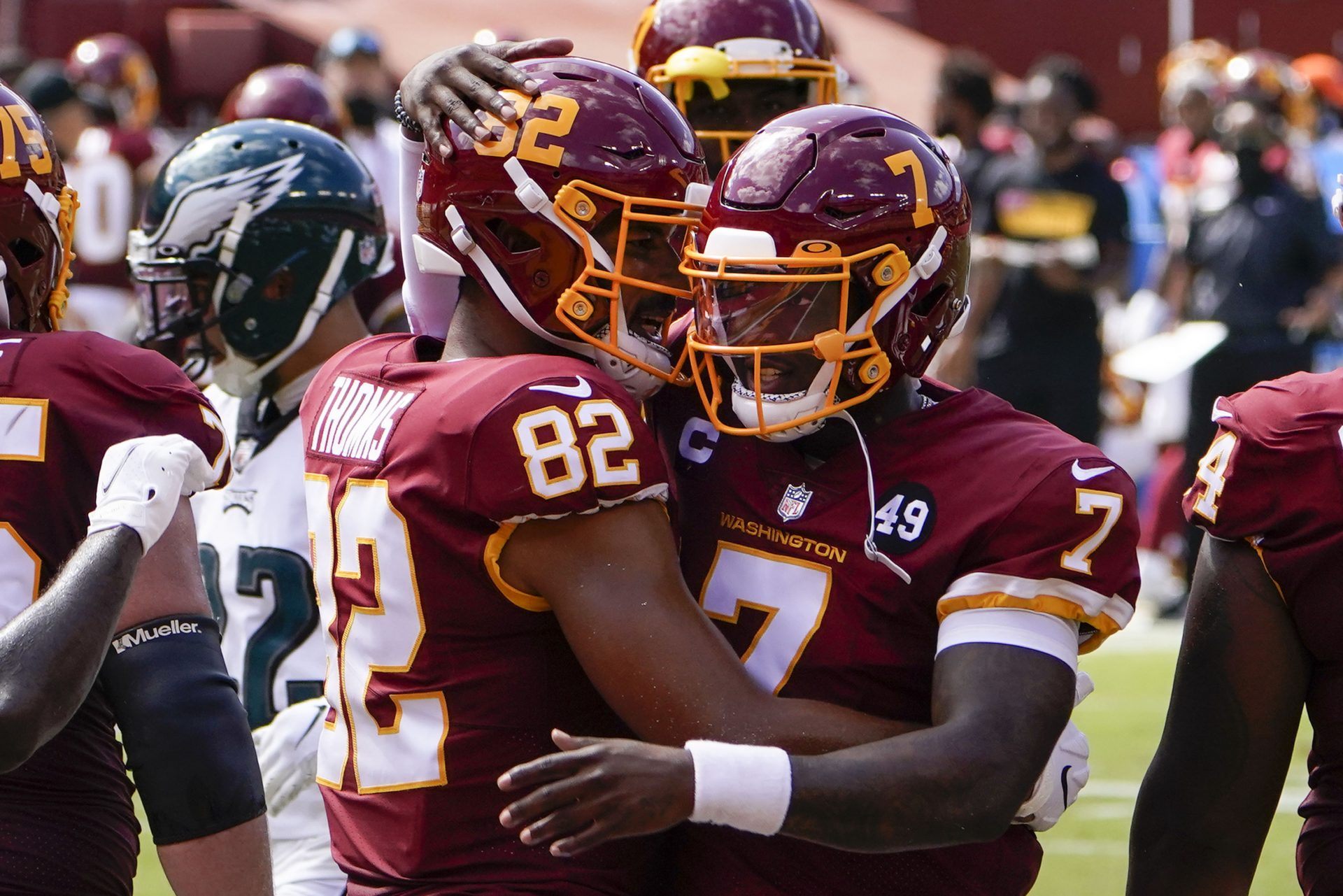 Washington Football Team tight end Logan Thomas (82) celebrates his touchdown against Philadelphia Eagles with teammate quarterback Dwayne Haskins (7), during the first half of an NFL football game, Sunday, Sept. 13, 2020, in Landover, Md.