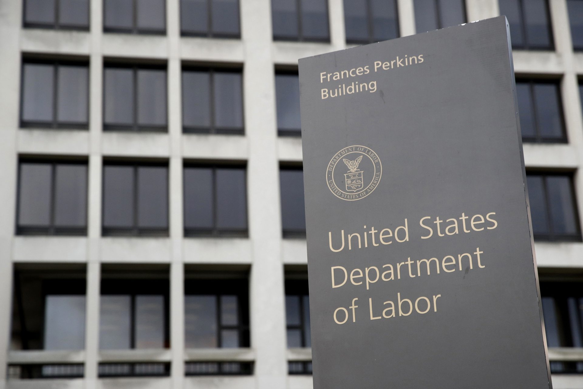 In this May 6, 2020 photo, a sign stands outside the Department of Labor's headquarters in Washington.