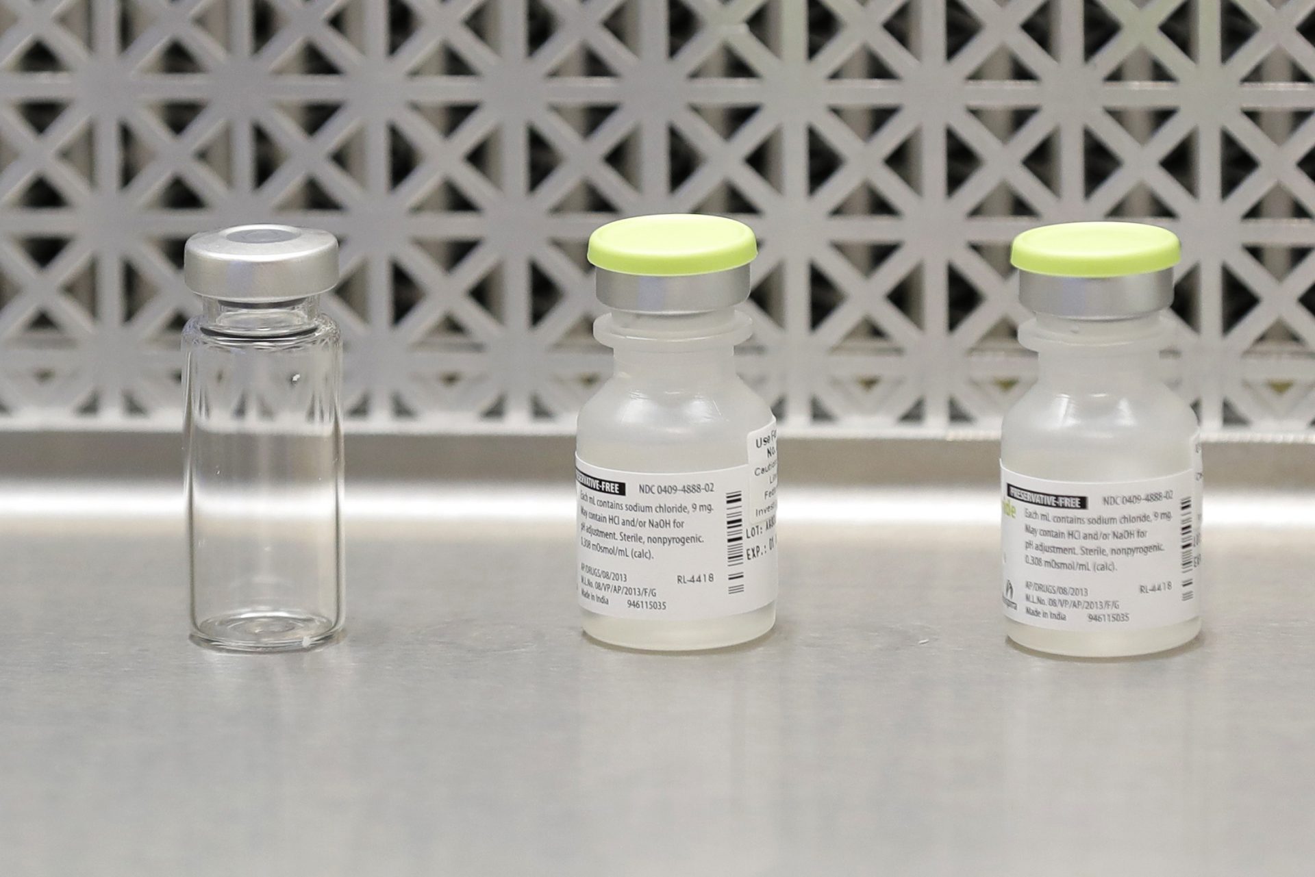 FILE PHOTO: This March 16, 2020 file photo shows vials used by pharmacists to prepare syringes used on the first day of a first-stage safety study clinical trial of the potential vaccine for COVID-19, the disease caused by the new coronavirus, in Seattle.