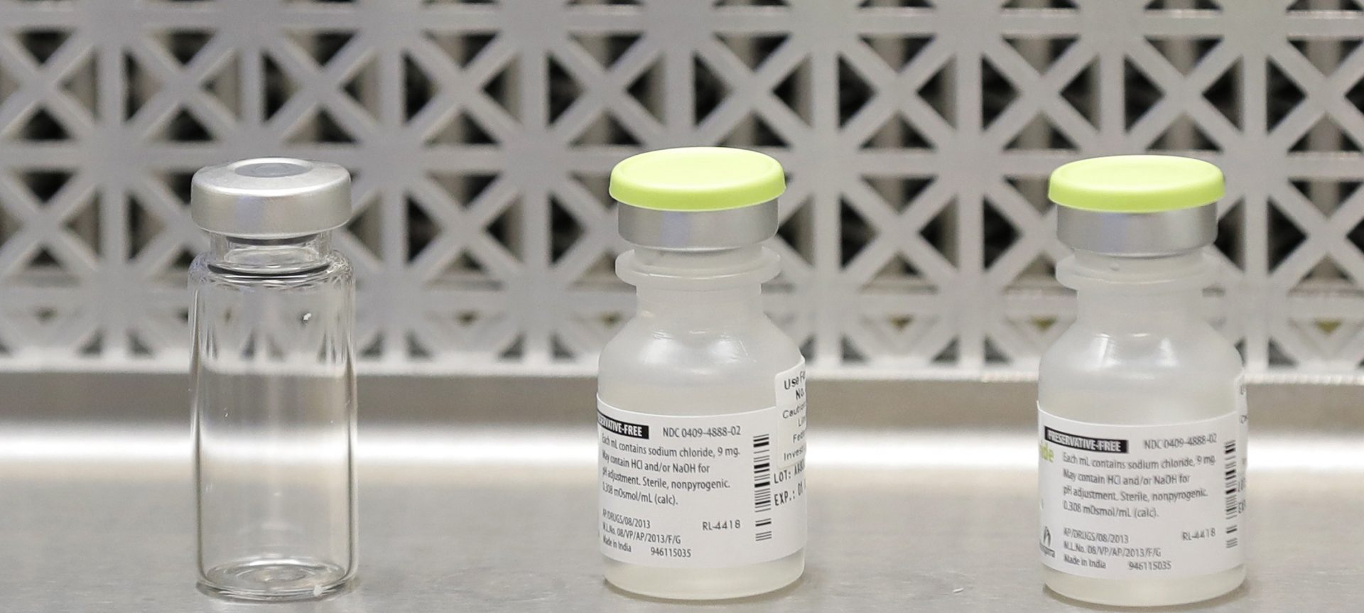 FILE PHOTO: This March 16, 2020 file photo shows vials used by pharmacists to prepare syringes used on the first day of a first-stage safety study clinical trial of the potential vaccine for COVID-19, the disease caused by the new coronavirus, in Seattle.