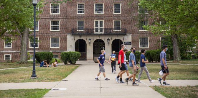 Students wearing masks on Penn State's University Park campus.