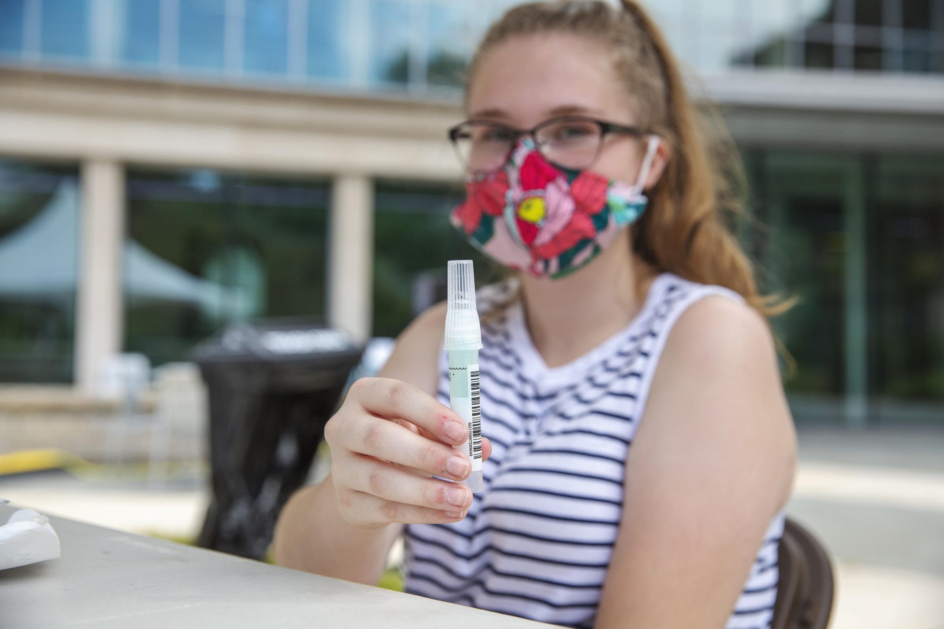 Penn State student Kaitlyn Harris did an asymptomatic saliva test at a mobile testing site in August. The university said Tuesday there are 433 total COVID-19 cases university-wide.