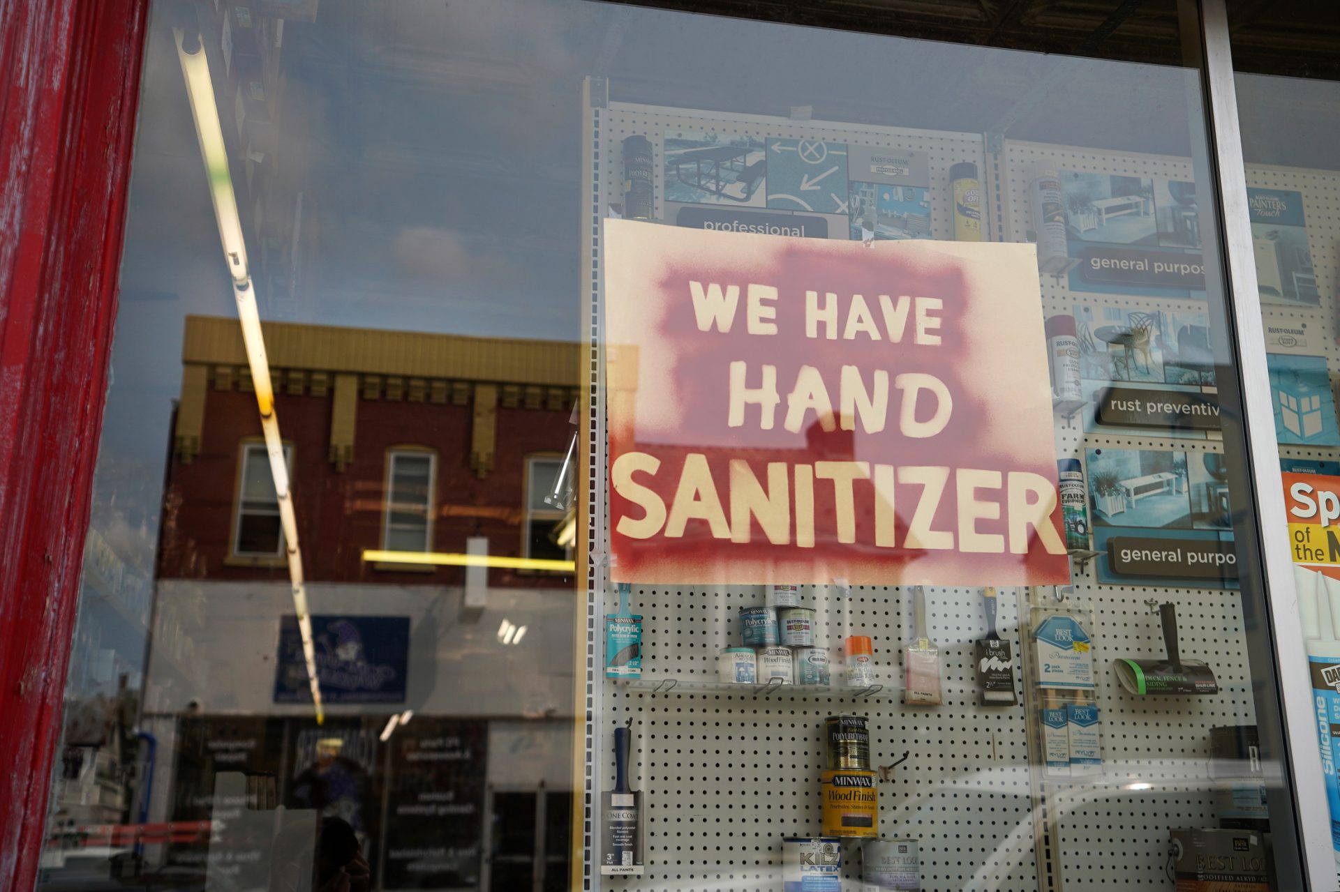 A sign advertising hand sanitizer hangs inside De Turk Hardware on Main Street in Kutztown.