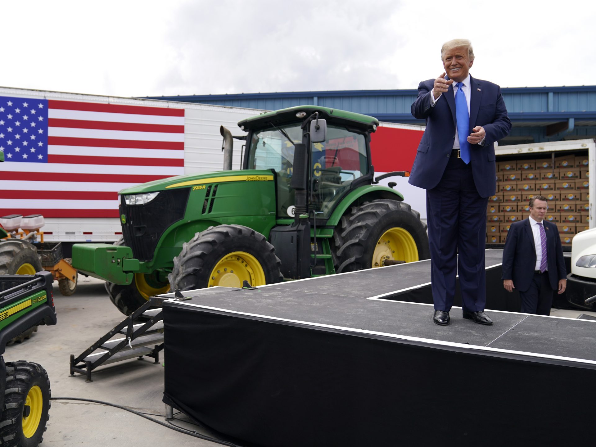 President Donald Trump arrives to deliver remarks on the "Farmers to Families Food Box Program" at Flavor First Growers and Packers, Monday, Aug. 24, 2020, in Mills River, N.C.