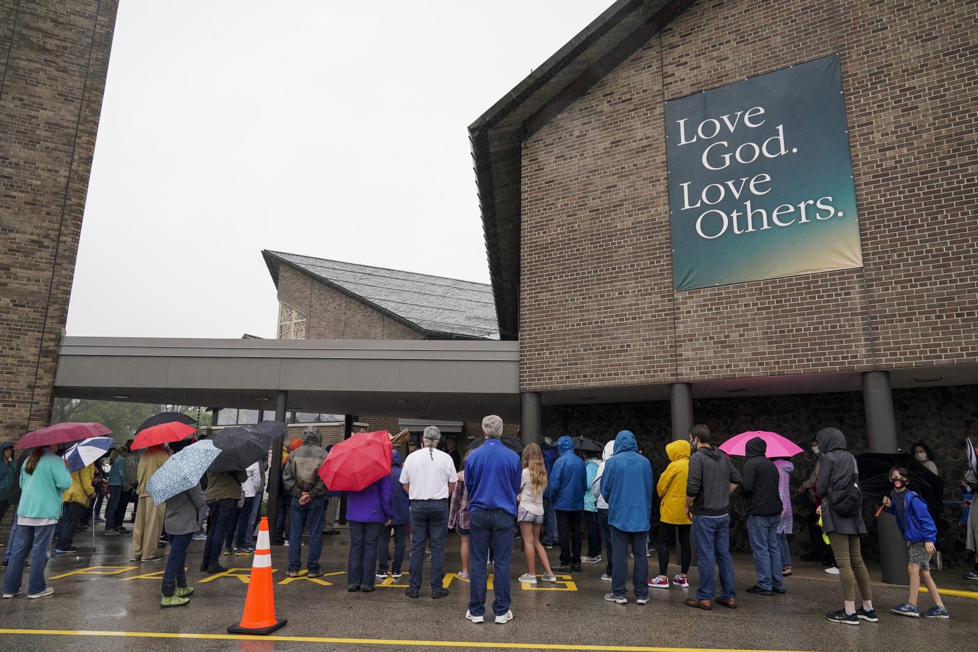 Churchgoers participate in a procession at the Holy Apostles Church in Milwaukee, Saturday, Sept. 12, 2020. For decades, Roman Catholic voters have been a pivotal swing vote in U.S. presidential elections, with a majority backing the winner, whether Republican or Democrat, nearly every time.