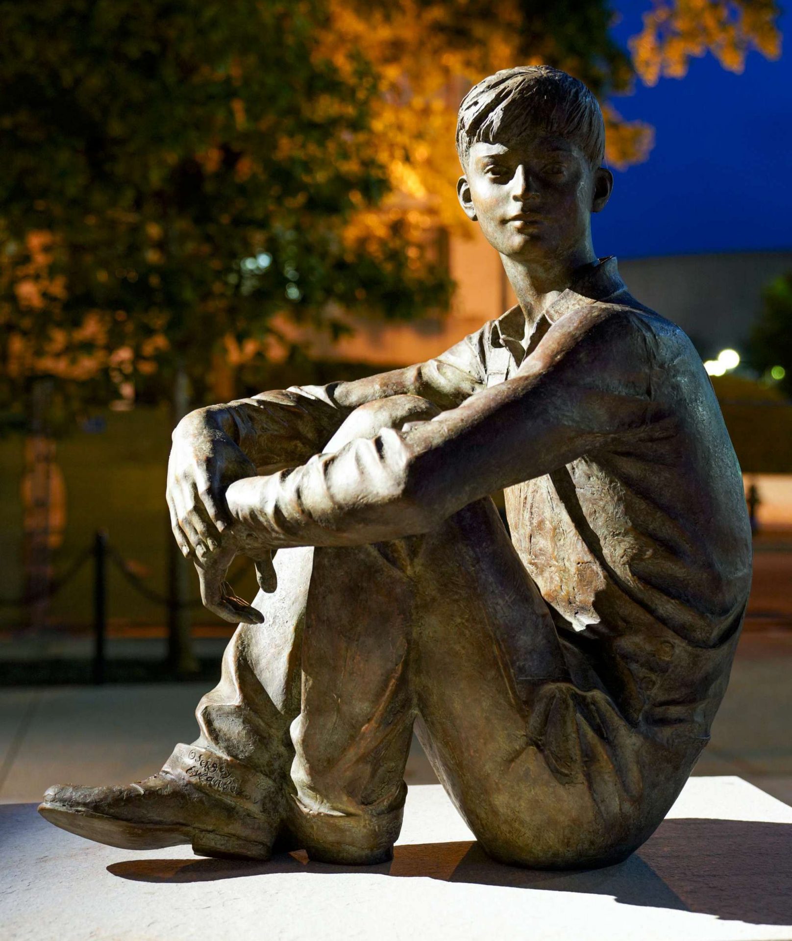 A life-size young Ike looks over at the statues depicting his future.