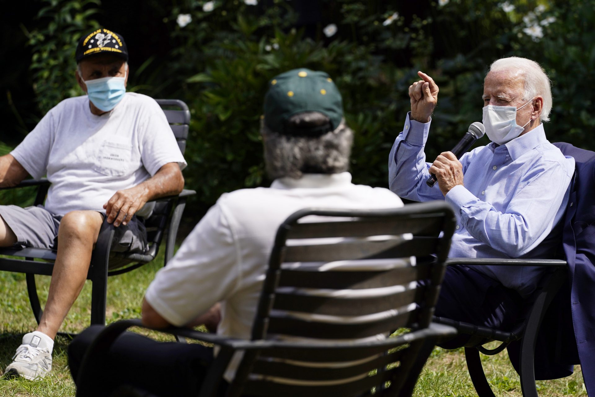 In this Sept. 7, 2020, file photo Democratic presidential candidate former Vice President Joe Biden speaks during an event with local union members in the backyard of a home in Lancaster, Pa. Campaigns are using different tactics in a pandemic election year unlike any other as candidates try to win over voters in down-ballot races that will determine control of Congress. Democrats, led by Biden, are keeping events small and mostly online.