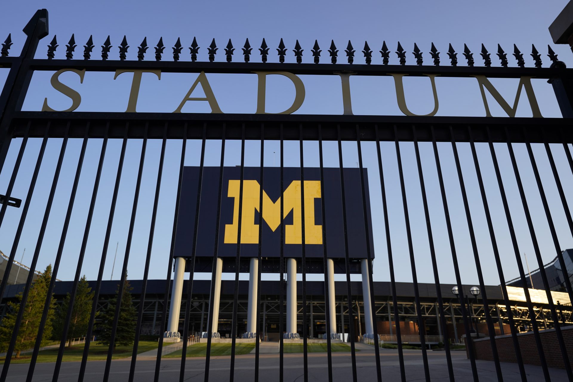 The University of Michigan football stadium is shown in Ann Arbor, Mich., Thursday, Aug. 13, 2020. A crumbling college football season took a massive hit Aug. 11, when the Big Ten and Pac-12, two historic and powerful conferences, succumbed to the COVID-19 pandemic and canceled their fall football seasons.