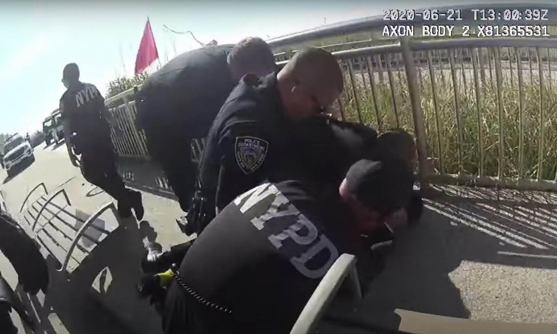 In this June 21, 2020, file image made from police body cam video, New York Police officers arrest a man on a boardwalk in New York. The man whose takedown by police, as shown in this photo, led to an officer being charged for using what officials said was an illegal chokehold. On Thursday, Sept. 17, 2020, a federal appeals court agreed to keep the release of New York City police disciplinary records on pause while public safety unions fight a lower-court decision that had cleared the way for their disclosure.