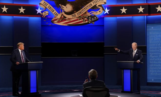 President Donald Trump, left, Democratic presidential candidate former Vice President Joe Biden, right, speaking during the first presidential debate with moderator Chris Wallace of Fox News, center, Tuesday, Sept. 29, 2020, at Case Western University and Cleveland Clinic, in Cleveland, Ohio. 