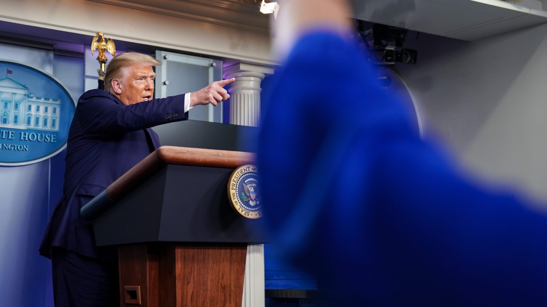 President Trump takes a question during a news conference at the White House on Sunday, where he dismissed reporting from the "New York Times" that he has paid little or no federal income taxes in recent years as "fake news."