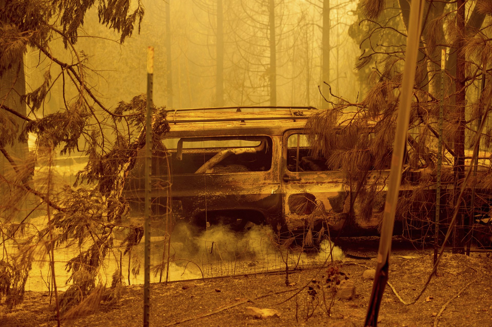 A scorched car rests in a clearing following the Bear Fire in Butte County, Calif., on Wednesday, Sept. 9, 2020. The blaze, part of the lightning-sparked North Complex, expanded at a critical rate of spread as winds buffeted the region.