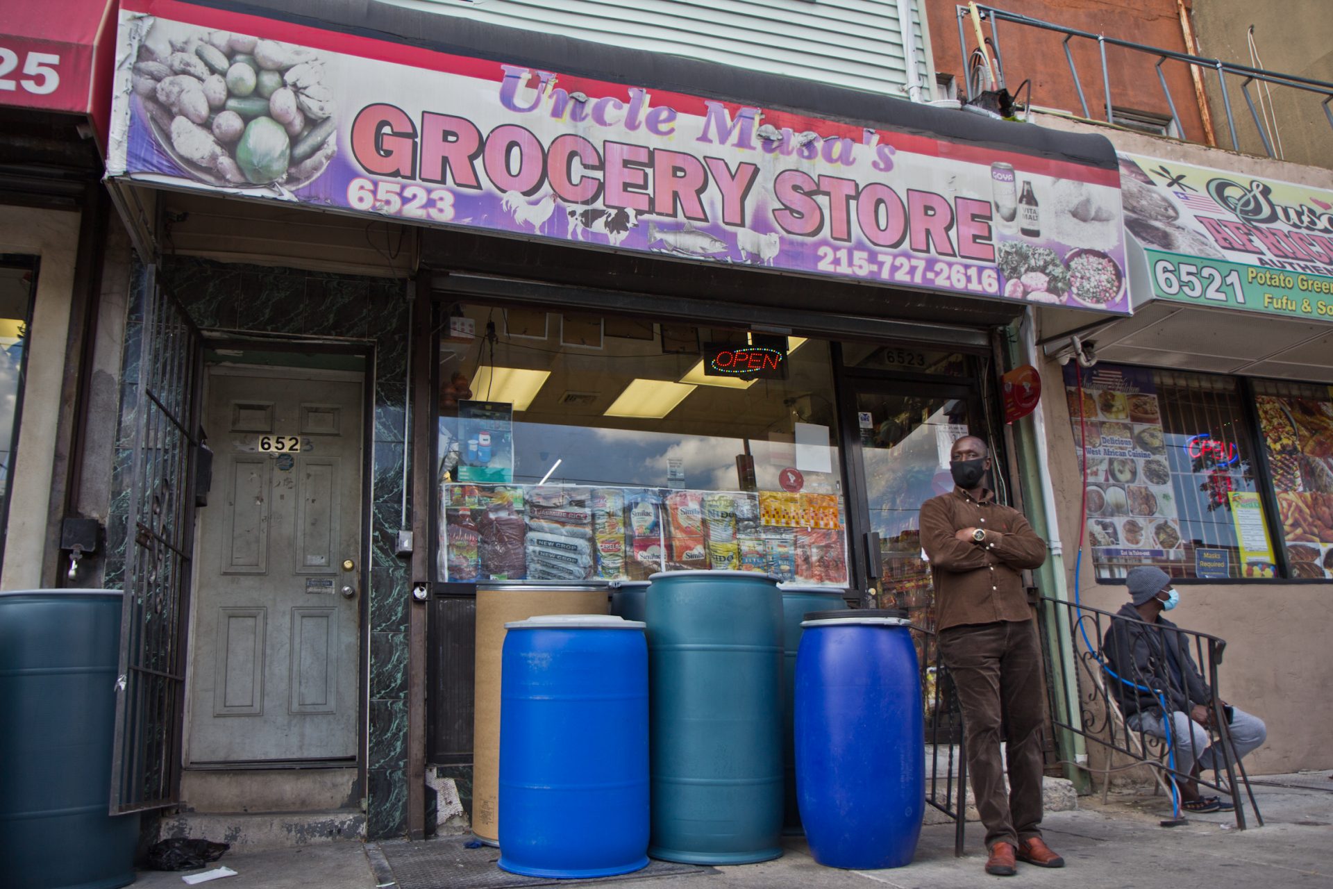 Musa Barry, owner of Uncle Musa’s Grocery, outside his store in Southwest Philadelphia.