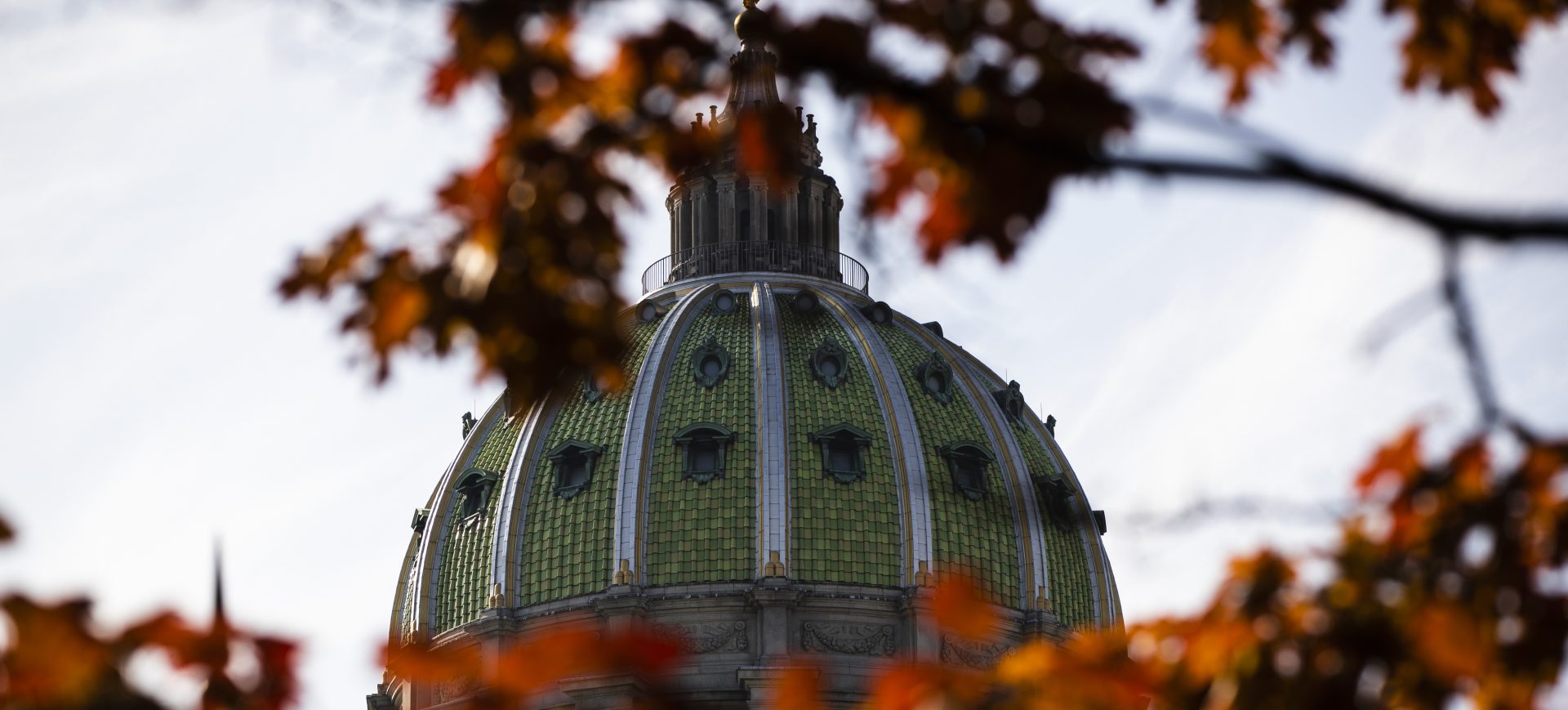 FILE PHOTO: In this file photo from Nov. 19, 2019, the dome of the Pennsylvania Capitol is visible through the fall trees in Harrisburg, Pa.