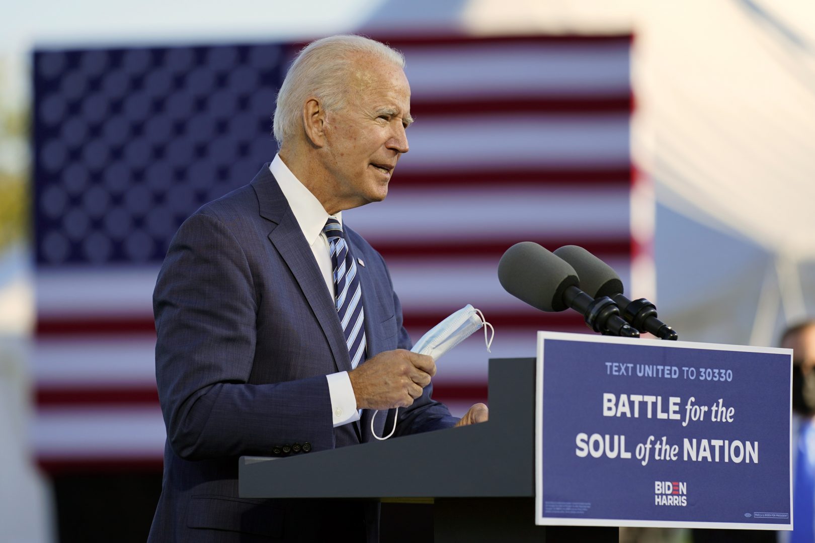 Democratic presidential candidate former Vice President Joe Biden talks about wearing a face mask as he speaks at Gettysburg National Military Park in Gettysburg, Pa., Tuesday, Oct. 6, 2020.