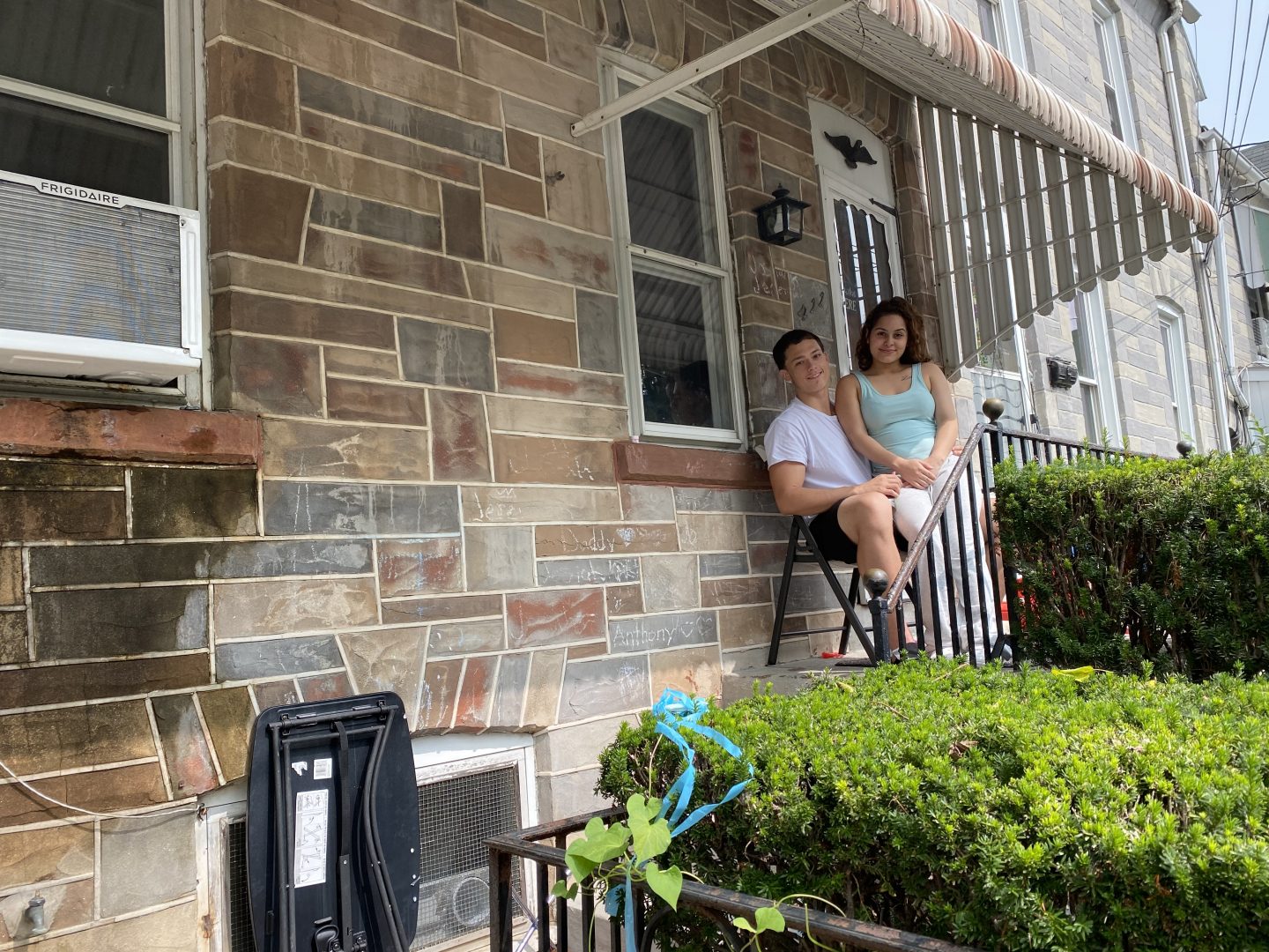 Danny Soto-Santiago and his partner Kayla Santiago outside of Kayla's Lancaster home. 