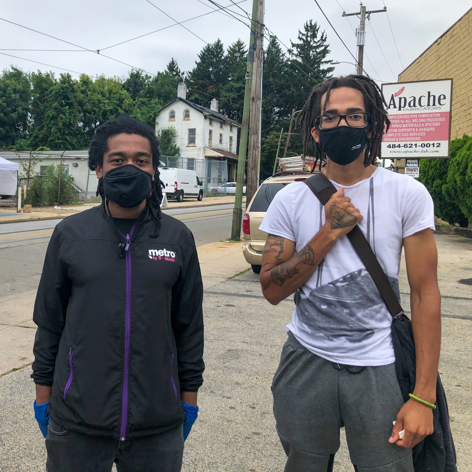 Brothers Tavier Thomas (left) and McKenzie Johnson on the day they were tested for the coronavirus at a Black Doctors COVID-19 Consortium testing site. Tavier, who studies history, explained that he feels more comfortable getting treatment from Black medical providers because of past abuses of Black people by white doctors and medical researchers in the U.S.