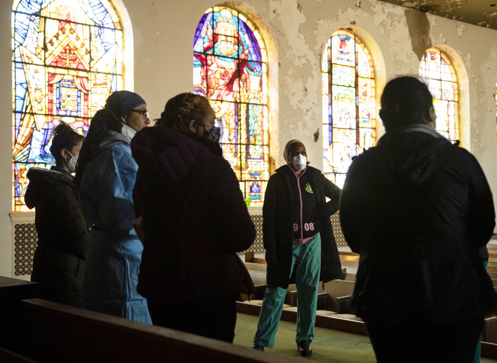 Stanford speaks with volunteers ahead of the opening of a "barrier free" COVID-19 test location outside Pinn Memorial Baptist Church in Philadelphia in April.