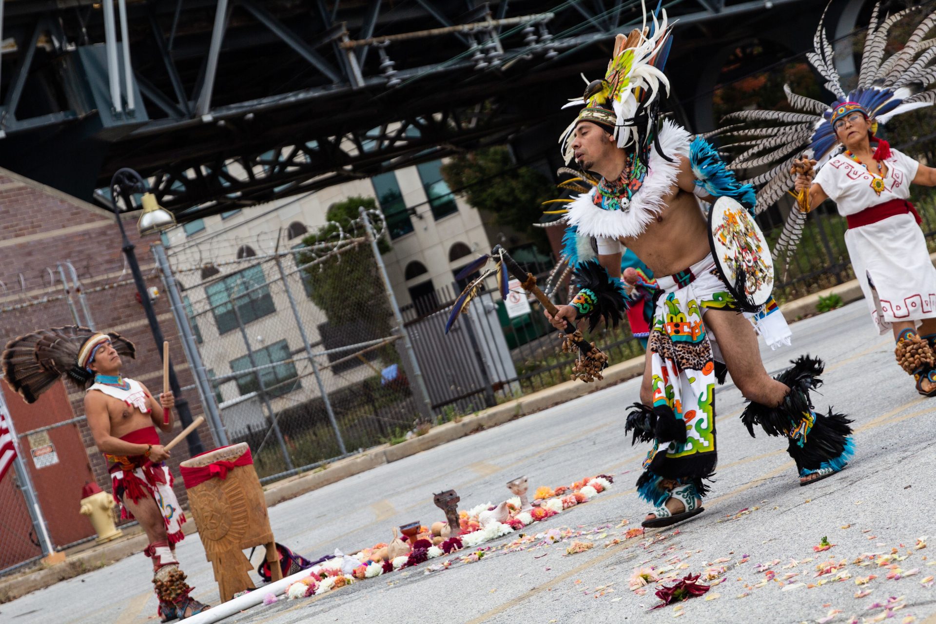 Javier Santamaria (center), an Indigenous dancer with Kapulli Kamaxtle Xiuhcoatl, helps kick off an Indigenous Peoples’ Day celebration and protest in Montgomery County, Pa. 