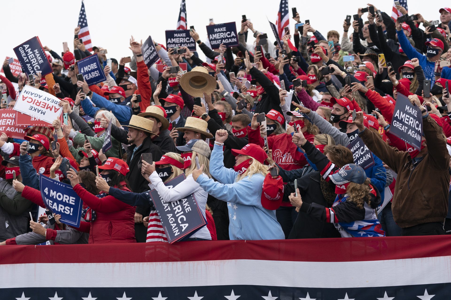 Supporters cheer before President Donald Trump speaks at a campaign rally at Lancaster Airport, Monday, Oct. 26, 2020, in Lititz, Pa.