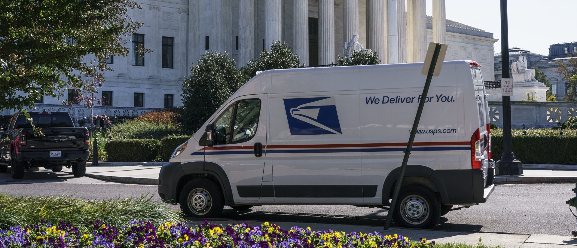 A U.S. Postal Service truck makes deliveries next to the Supreme Court on Election Day, Tuesday, Nov. 3, 2020, in Washington. President Donald Trump says he's planning an aggressive legal strategy to try prevent Pennsylvania from counting mailed ballots that are received in the three days after the election, a matter that could find its way to the high court.