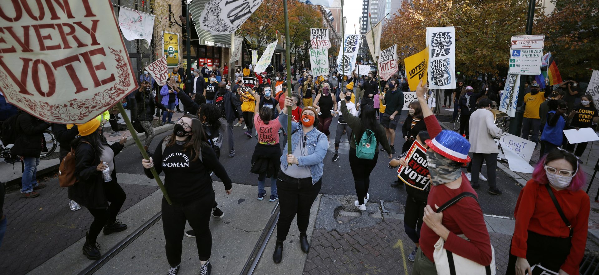 Demonstrators dance in the street outside the Pennsylvania Convention Center where votes are being counted, Thursday, Nov. 5, 2020, in Philadelphia, following Tuesday's election.